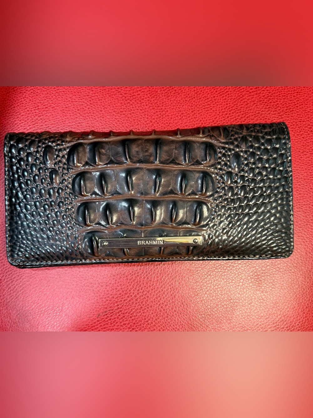 Brahmin Ady Slim Bifold Wallet in an embossed crocodile-pattern